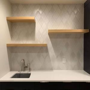 The addition of the shelving and tile really makes this sink pop